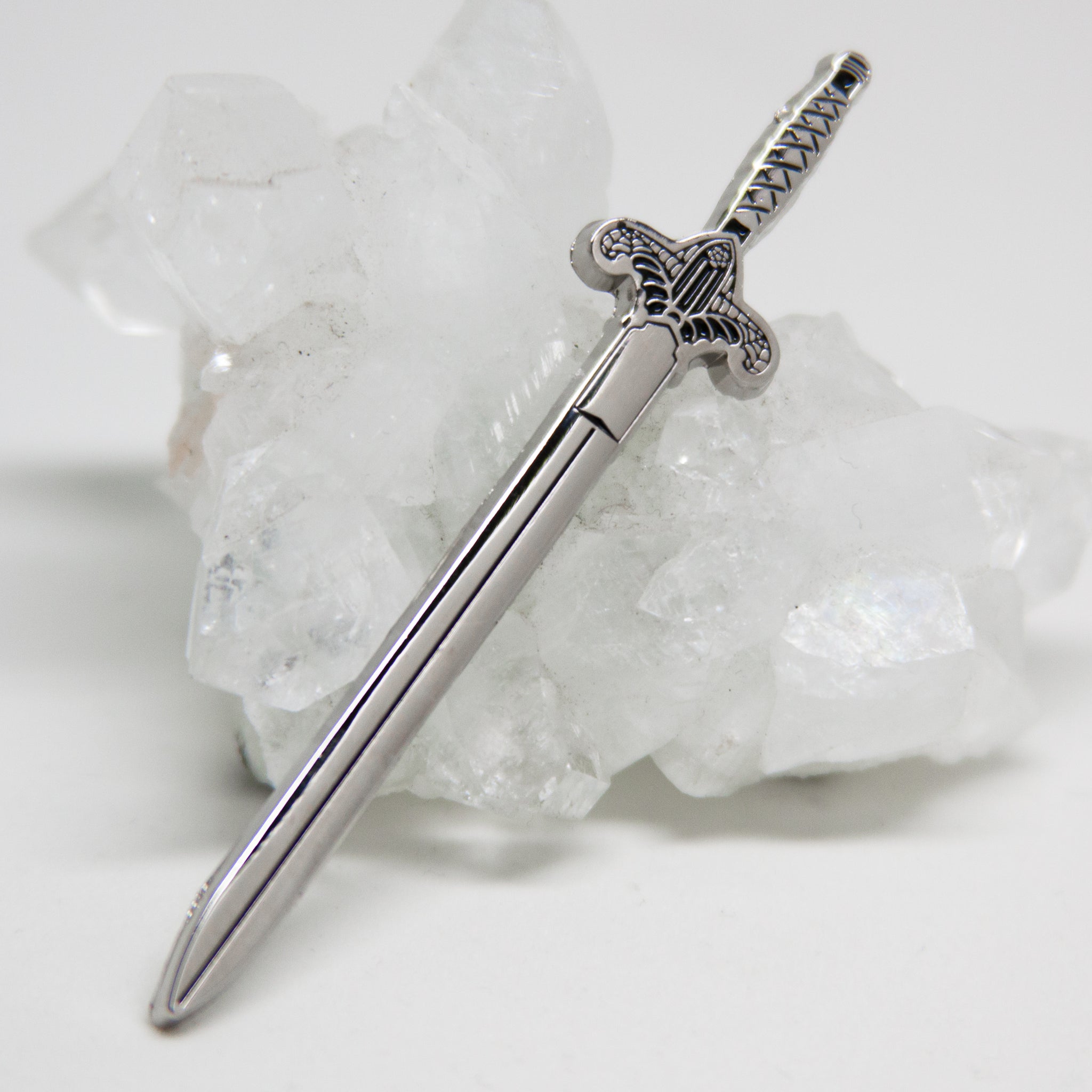 Gothic Sword enamel pin in silver and black enamel.