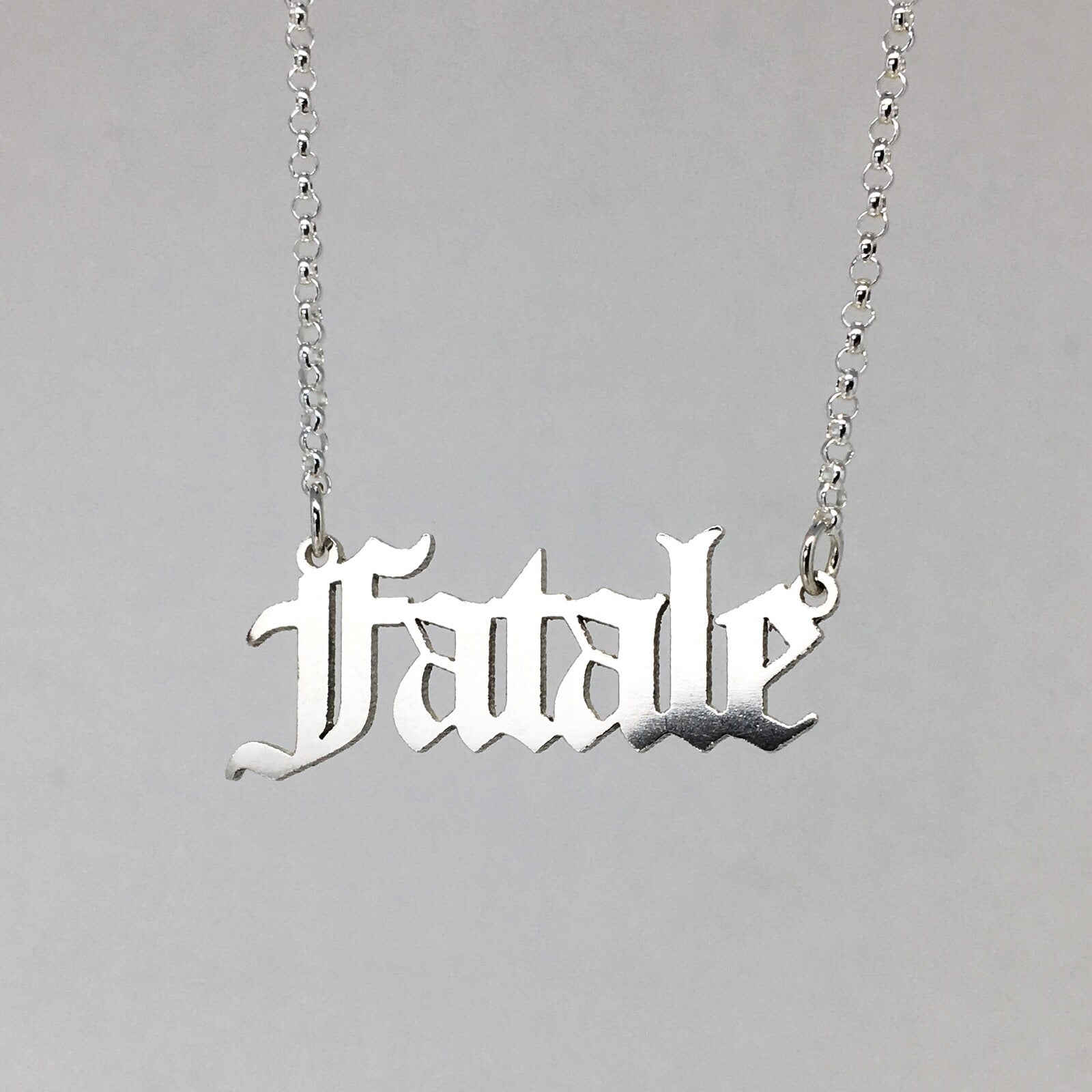 Sterling silver Fatale nameplate necklace in gothic blackletter font. 