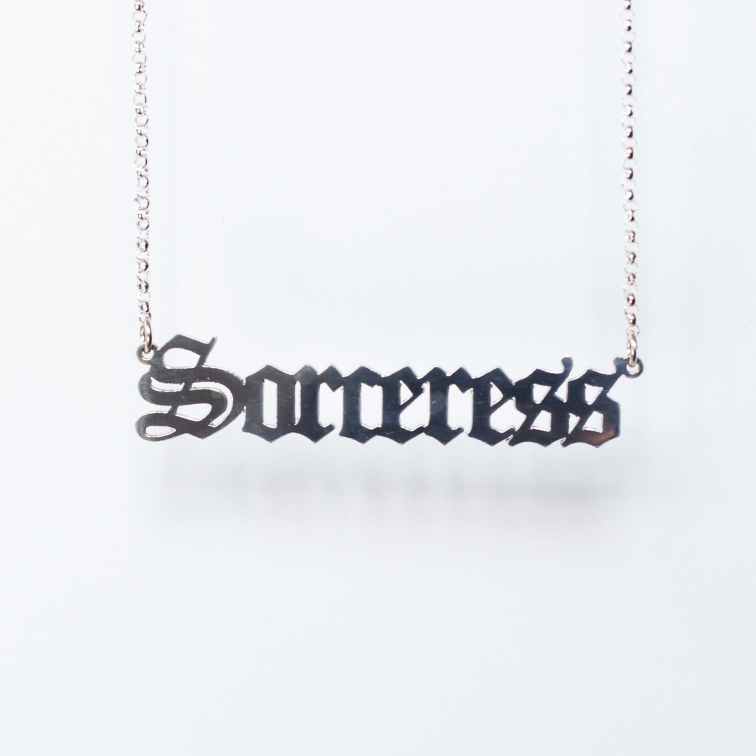 Sorceress Necklace in gothic blackletter font in sterling silver