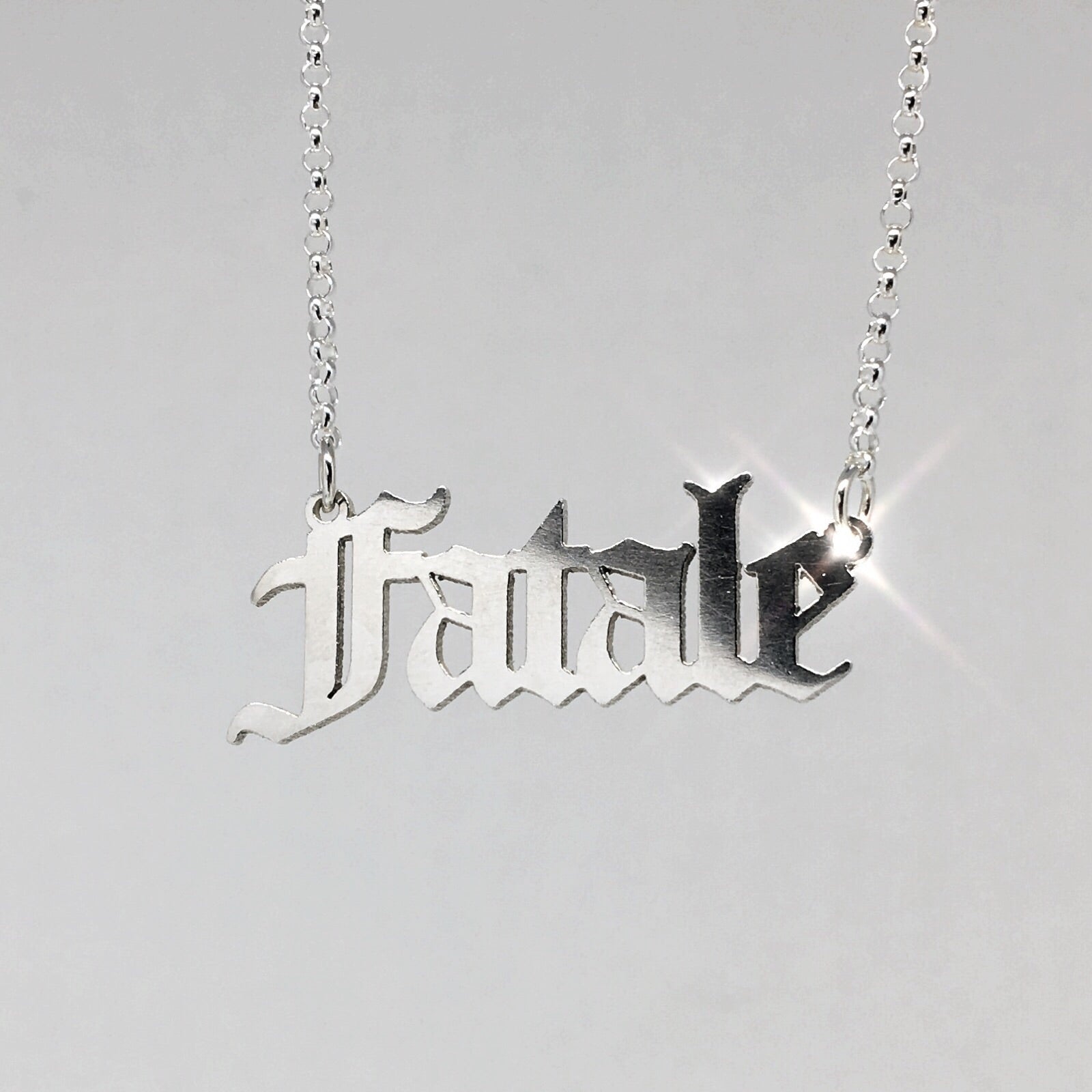 Sterling silver Fatale nameplate necklace in gothic blackletter font. 