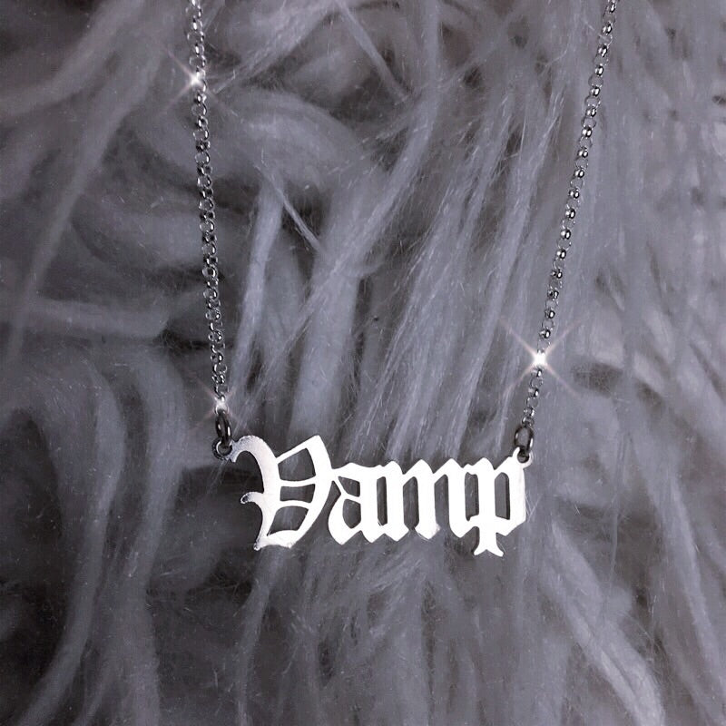 Sterling silver Vamp nameplate necklace in gothic blackletter font.